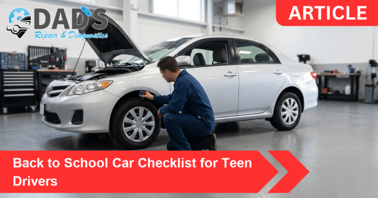 Technician checking tire tread during a back to school car checklist inspection